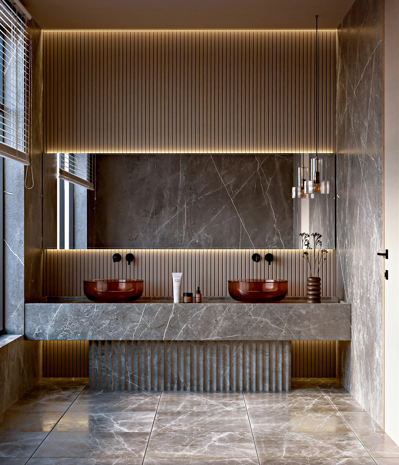 Dark marble bathroom with brass fixtures